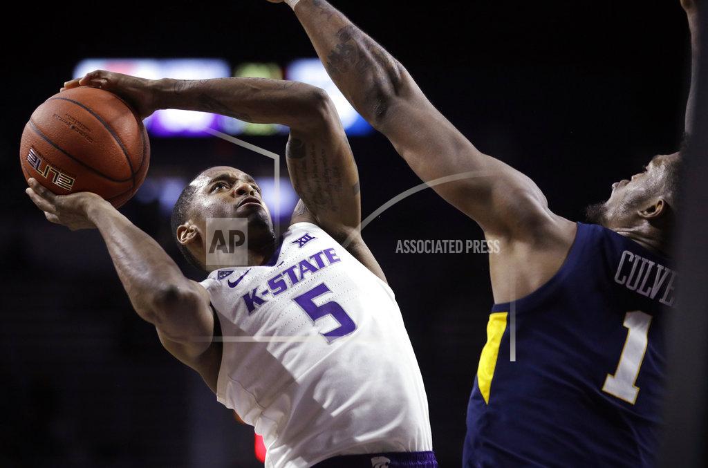 Orlin Wagner Kansas State guard Barry Brown Jr. (5) shoots over West Virginia forward Derek Culver (1) during the second half of an NCAA college basketball game in Manhattan, Kan., Wednesday, Jan. 9, 2019. (AP Photo/Orlin Wagner)