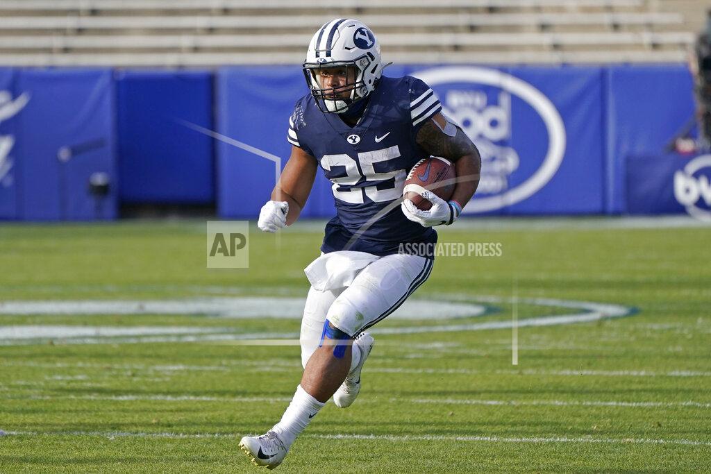 Rick Bowmer BYU running back Tyler Allgeier (25) carries the ball against UTSA in the second half during an NCAA college football game Saturday, Oct. 10, 2020, in Provo, Utah. (AP Photo/Rick Bowmer, Pool)