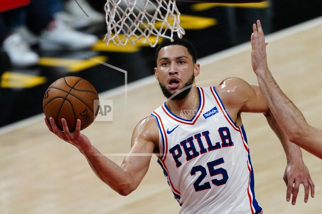John Bazemore FILE - Philadelphia 76ers guard Ben Simmons (25) goes to the basket during their NBA playoff basketball game against the Atlanta Hawks, in Atlanta, in this Saturday, June 12, 2021, file photo. Simmons says he's taking his ball and going home. The 76ers say they still want their disgruntled All-Star guard. (AP Photo/John Bazemore, File)