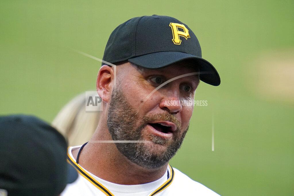 Gene J. Puskar Retired Pittsburgh Steelers quarterback Ben Roethlisberger talks with Pittsburgh Pirates relief pitcher David Bednar before throwing out a ceremonial first pitch before a baseball game between the Pirates and the Philadelphia Phillies in Pittsburgh, Friday, July 29, 2022. (AP Photo/Gene J. Puskar)