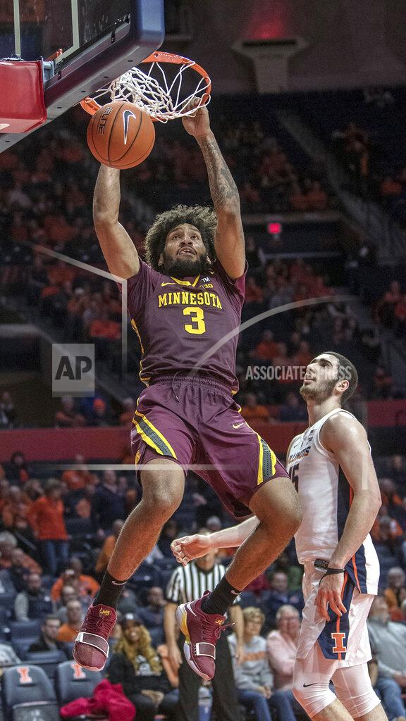Rick Danzl Minnesota forward Jordan Murphy (3) dunks over Illinois forward Giorgi Bezhanishvili during the second half of an NCAA college basketball game in Champaign, Ill., Wednesday, Jan. 16, 2019. Illinois won 95-68. (AP Photo/Rick Danzl)