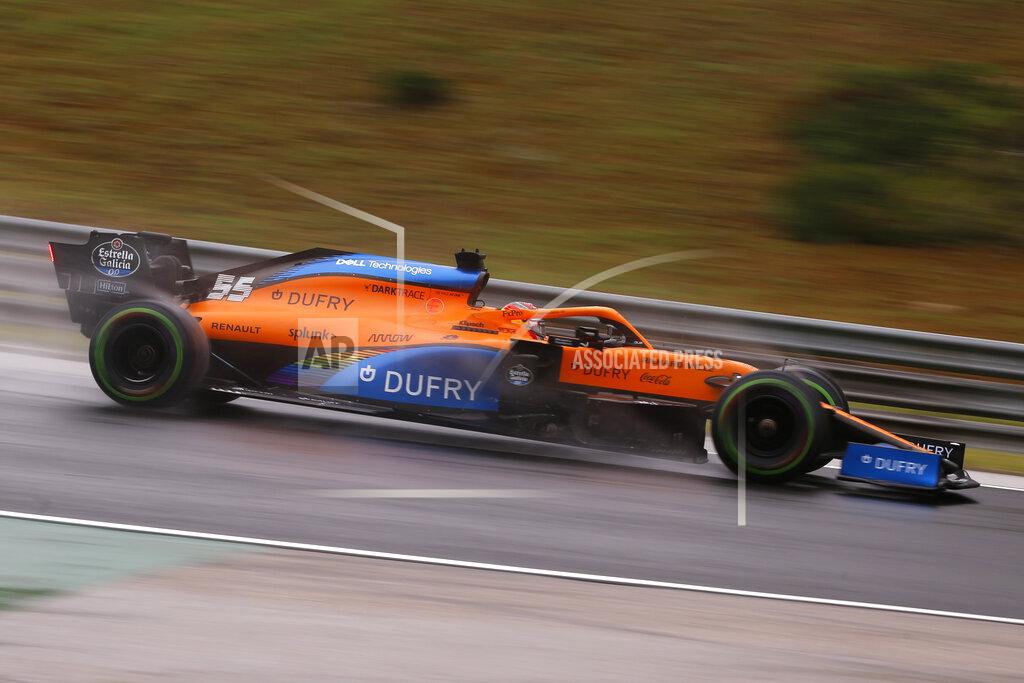 Darko Bandic Mclaren driver Carlos Sainz of Spain steers his car during the second practice session for the Hungarian Formula One Grand Prix at the Hungaroring racetrack in Mogyorod, Hungary, Friday, July 17, 2020. The Hungarian F1 Grand Prix will be held on Sunday. (Darko Bandic/Pool via AP)