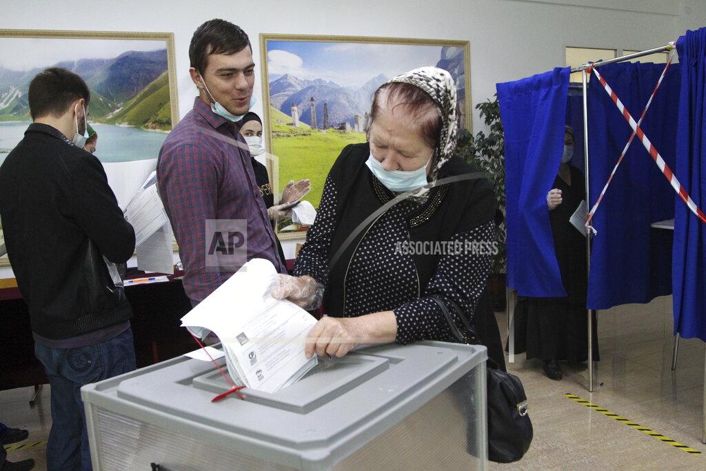 Musa Sadulayev An elderly woman casts her ballot at a polling station during the Parliamentary elections in Grozny, Russia, Saturday, Sept. 18, 2021. Sunday will be the last of three days voting for a new parliament, but there seems to be no expectation that United Russia, the party devoted to President Vladimir Putin, will lose its dominance in the State Duma. (AP Photo/Musa Sadulayev)