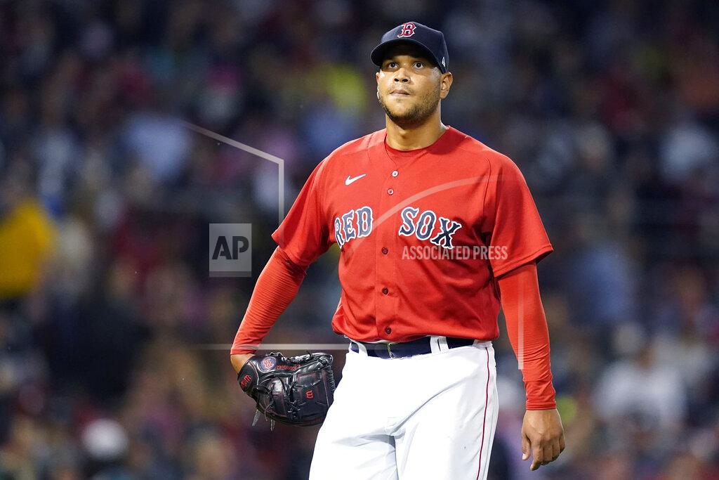 Elise Amendola Boston Red Sox starting pitcher Eduardo Rodriguez walks to the dugout after being removed during the fourth inning of the team's baseball game against the Toronto Blue Jays at Fenway Park, Thursday, July 29, 2021, in Boston. (AP Photo/Elise Amendola)