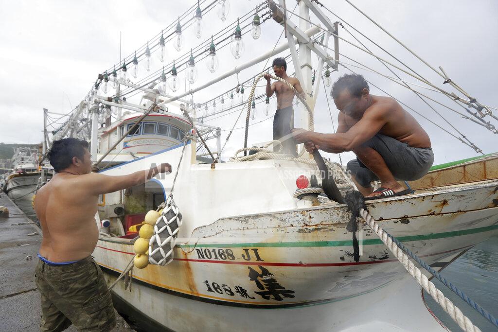 Chiang Ying-Ying Fishermen fasten the boat as Typhoon Chanthu approaches to Taiwan in Keelung, New Taipei City, Taiwan, Saturday, Sept. 11, 2021. Taiwan’s weather bureau warned of high winds and heavy rain as Typhoon Chanthu roared toward the island Saturday and said the storm’s center was likely to pass its east coast instead of hitting land. (AP Photo/Chiang Ying-ying)
