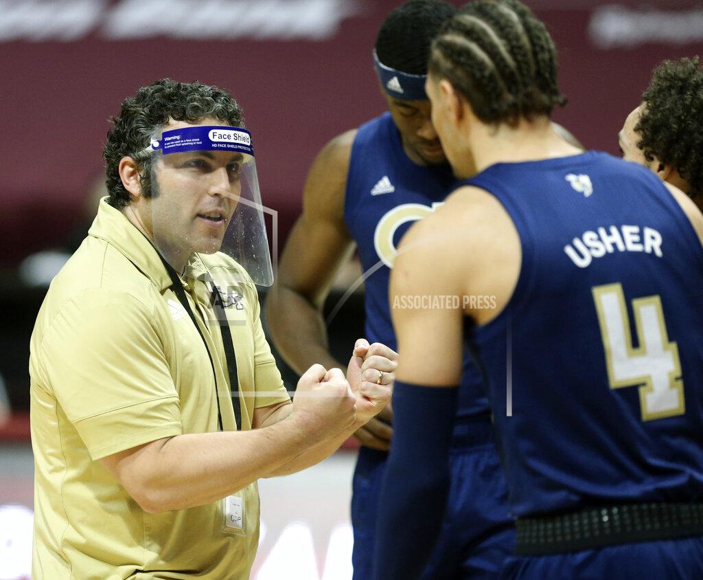 Matt Gentry Georgia Tech head coach Josh Pastner speaks with Jordan Usher (4) during the first half of an NCAA college basketball game against Virginia Tech Tuesday, Feb. 23, 2021, in Blacksburg, Va. (Matt Gentry/The Roanoke Times via AP, Pool)