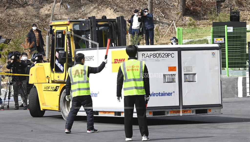 Uncredited A container containing AstraZeneca's coronavirus vaccines is transported at a distribution center in Icheon, South Korea, Wednesday, Feb. 24, 2021. South Korea's top infectious disease expert has warned that vaccines will not end the coronavirus pandemic quickly as the country prepared to give its first vaccinations this week. (Yonhap via AP)