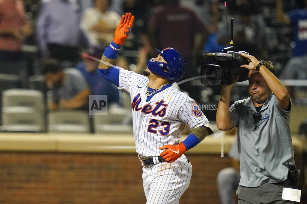 Frank Franklin Ii New York Mets' Javier Baez (23) gestures after hitting a home run during the ninth inning of a baseball game against the St. Louis Cardinals Tuesday, Sept. 14, 2021, in New York. (AP Photo/Frank Franklin II)