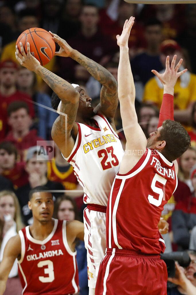 Charlie Neibergall Iowa State forward Zoran Talley Jr. (23) shoots over Oklahoma forward Matt Freeman (5) during the first half of an NCAA college basketball game, Monday, Feb. 25, 2019, in Ames, Iowa. (AP Photo/Charlie Neibergall)