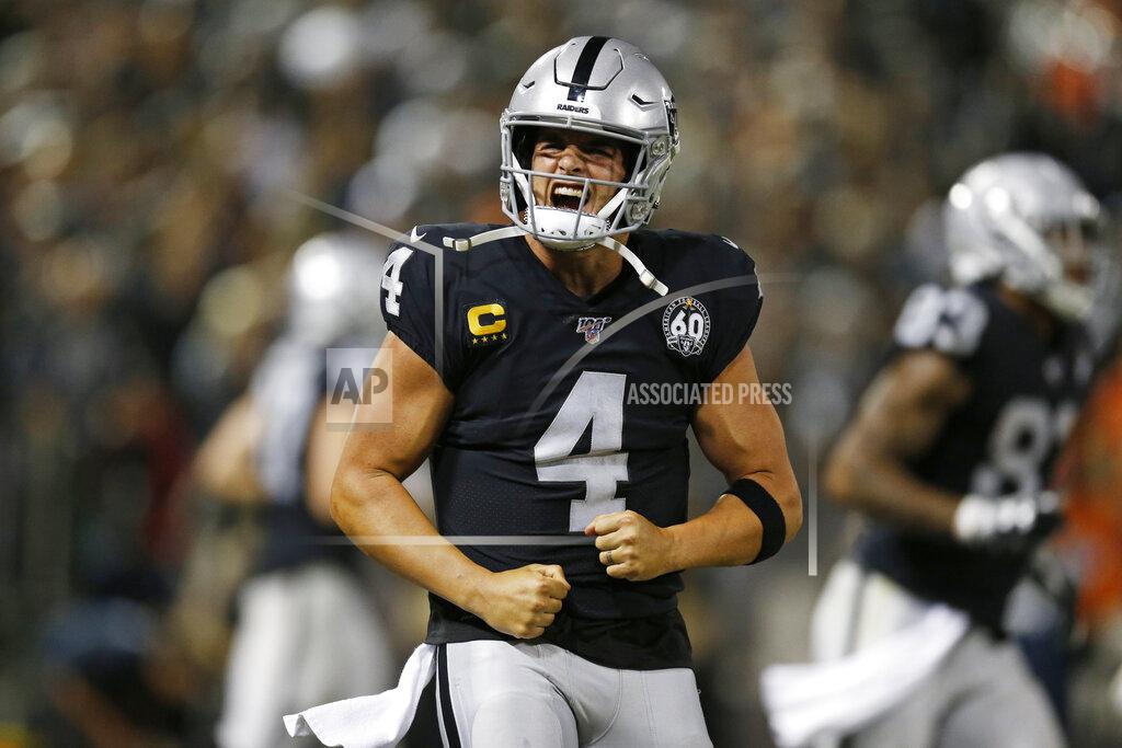 D. Ross Cameron Oakland Raiders quarterback Derek Carr reacts after running back Josh Jacobs scored a touchdown during the fourth quarter of an NFL football game against the Denver Broncos Monday, Sept. 9, 2019, in Oakland, Calif. (AP Photo/D. Ross Cameron)
