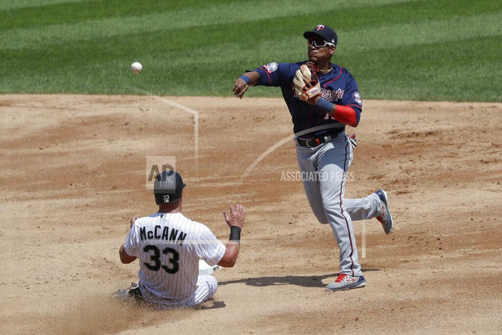 Nam Y. Huh Minnesota Twins shortstop Jorge Polanco, right, throws to first after forcing out Chicago White Sox's James McCann at second during the third inning of a baseball game in Chicago, Saturday, July 25, 2020. Chicago White Sox's Leury Garcia was safe at first. (AP Photo/Nam Y. Huh)