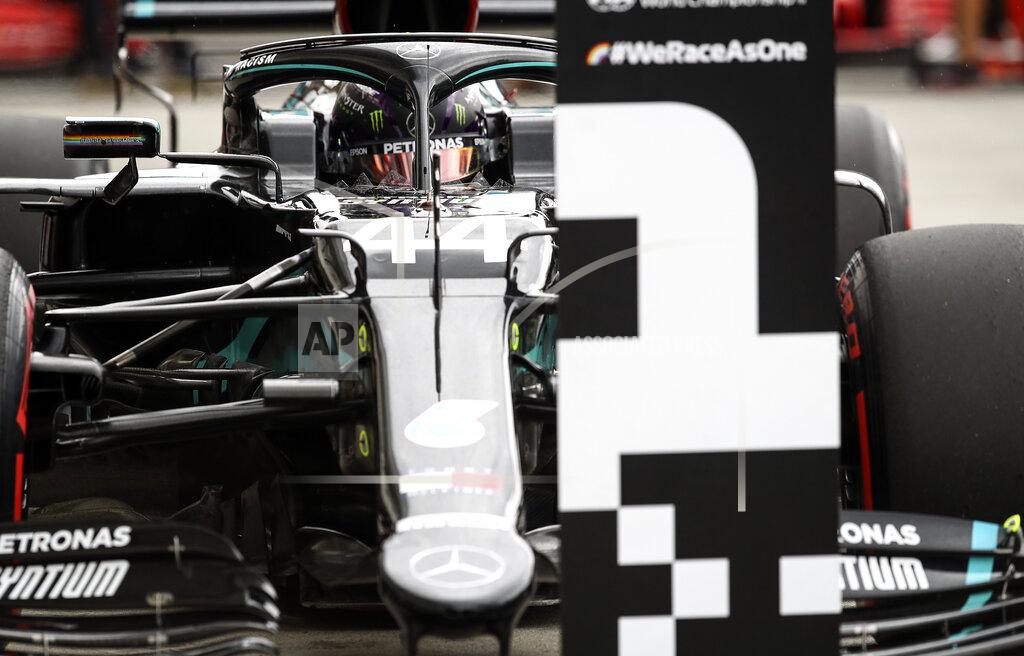 Mark Thompson Mercedes driver Lewis Hamilton of Britain finishes first after the qualifying for the Hungarian Formula One Grand Prix at the Hungaroring racetrack in Mogyorod, Hungary, Saturday, July 18, 2020. The Hungarian F1 Grand Prix will be held on Sunday. (Mark Thompson/Pool via AP)
