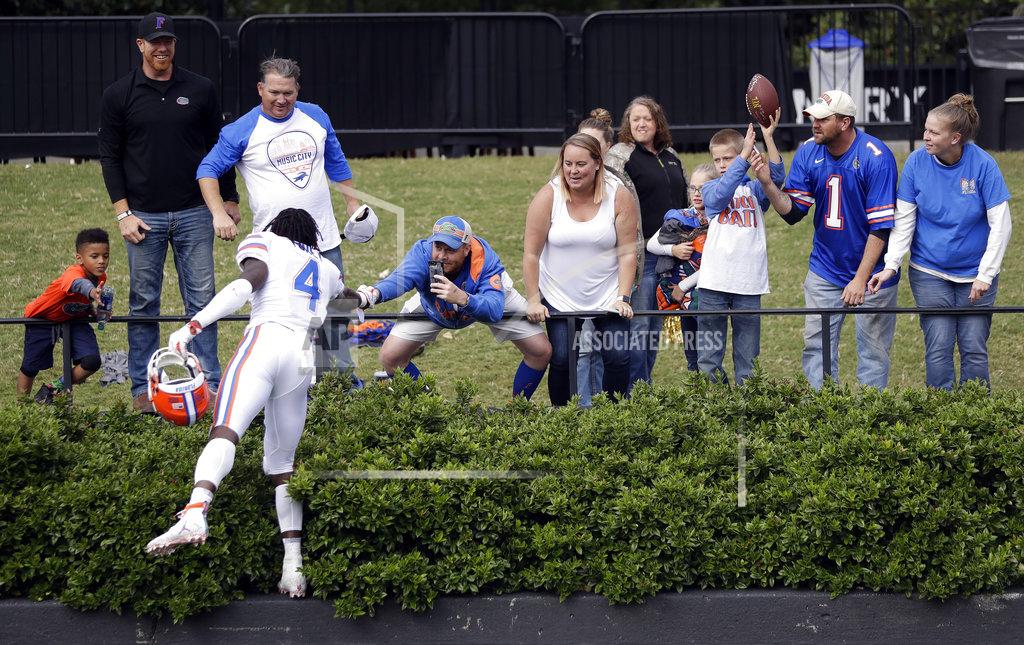 Mark Humphrey Florida running back Kadarius Toney (4) celebrates with fans the Gators defeated Vanderbilt 37-27 in an NCAA college football game Saturday, Oct. 13, 2018, in Nashville, Tenn. (AP Photo/Mark Humphrey)