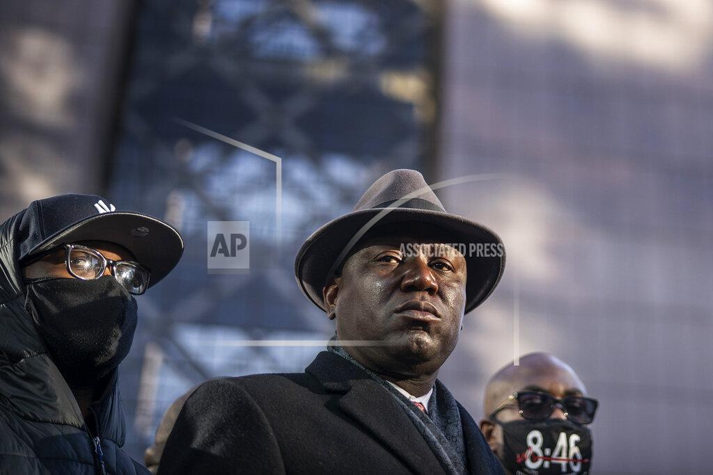 Jerry Holt FILE - In this Monday, March 29, 2021 file photo, from left, Terrence Floyd, brother of George Floyd; attorney Ben Crump and Philonise Floyd, brother of George Floyd, hold a news conference at the Hennepin County Government Center in Minneapolis, Minn., on the first day of the Derek Chauvin murder trial. (Jerry Holt/Star Tribune via AP)