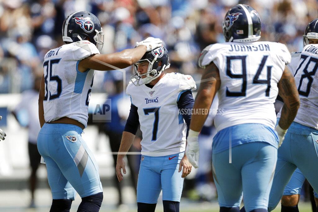 James Kenney Tennessee Titans kicker Cairo Santos (7) is congratulated by MyCole Pruitt (85) after Santos kicked the extra point after a touchdown against the Indianapolis Colts in the second half of an NFL football game Sunday, Sept. 15, 2019, in Nashville, Tenn. (AP Photo/James Kenney)