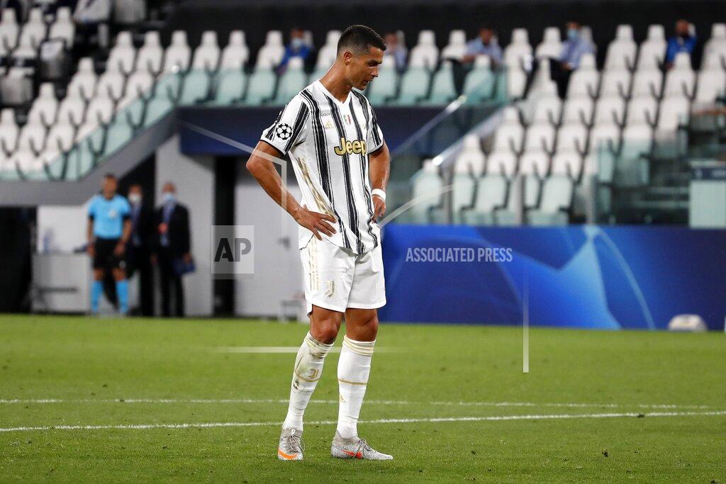 Antonio Calanni Juventus' Cristiano Ronaldo reacts during the Champions League round of 16 second leg, soccer match between Juventus and Lyon at the Allianz stadium in Turin, Italy, Friday, Aug. 7, 2020. (AP Photo/Antonio Calanni)