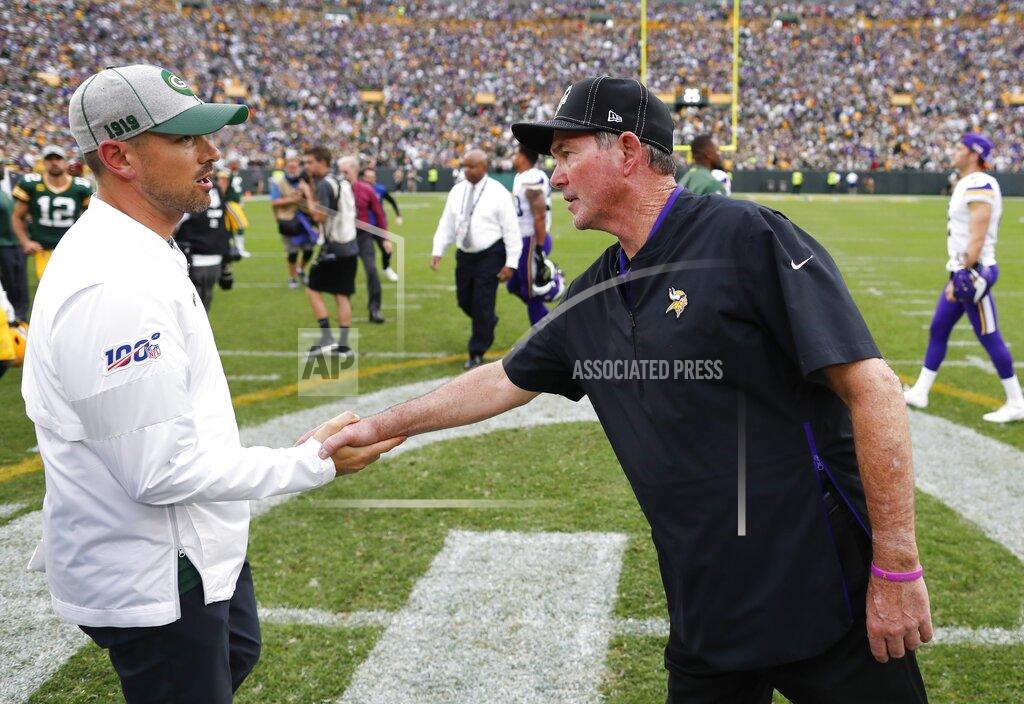 Matt Ludtke Minnesota Vikings head coach Mike Zimmer talks to Green Bay Packers head coach Matt LaFleur after an NFL football game Sunday, Sept. 15, 2019, in Green Bay, Wis. The Packers won 21-16. (AP Photo/Matt Ludtke)