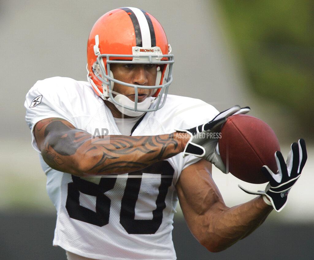 Mark Duncan FILE - In this July 27, 2006 file photo, Cleveland Browns' Kellen Winslow Jr. catches a pass during NFL football training camp practice in Berea, Ohio. Winslow pleaded guilty Monday, Nov. 4, 2019, to raping an unconscious teen and sexual battery involving a 54-year-old hitchhiker. (AP Photo/Mark Duncan, File)