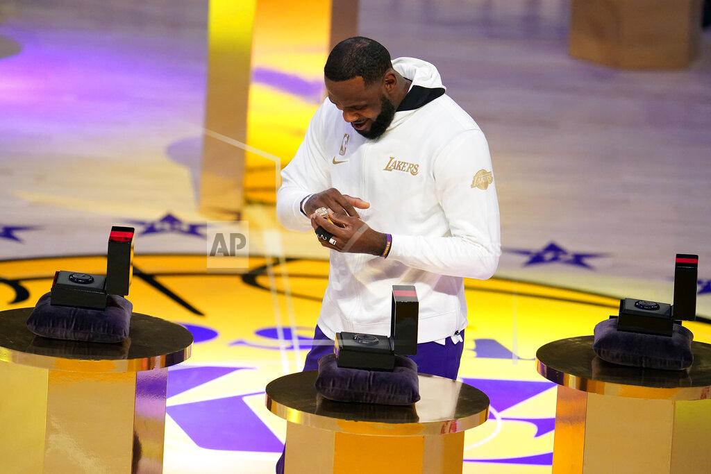 Marcio Jose Sanchez Los Angeles Lakers forward LeBron James receives his NBA championship ring before an NBA basketball game against the Los Angeles Clippers, Tuesday, Dec. 22, 2020, in Los Angeles. (AP Photo/Marcio Jose Sanchez)