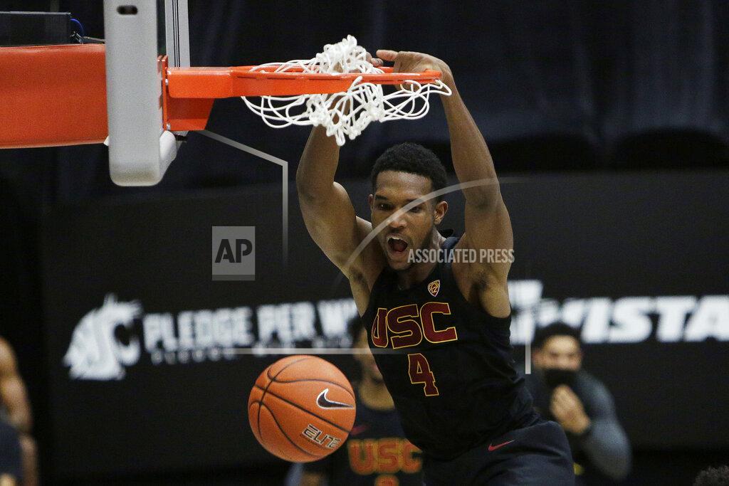 Young Kwak FILE - In this Feb. 13, 2021, file photo, Southern California's Evan Mobley dunks during the second half of the team's NCAA college basketball game against Washington State in Pullman, Wash. Mobley was selected by the Cleveland Cavaliers in the NBA draft Thursday, July 29. (AP Photo/Young Kwak, File)