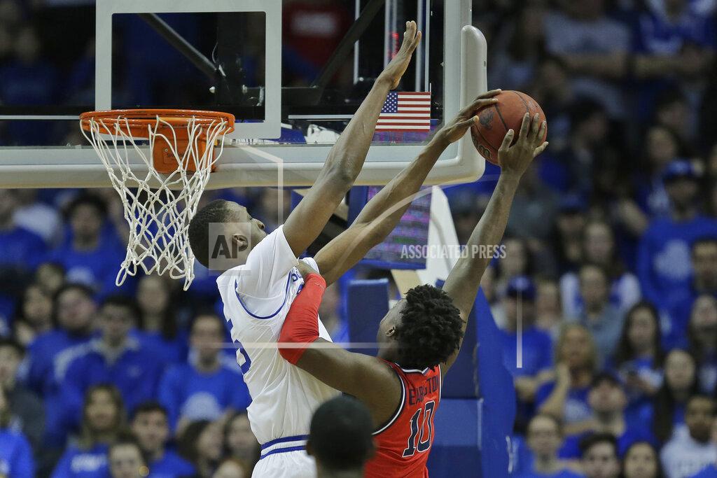 Seth Wenig Seton Hall's Romaro Gill, left blocks a shot by St. John's Marcellus Earlington during the second half of an NCAA college basketball game in Newark, N.J., Sunday, Feb. 23, 2020. Seton Hall defeated St. John's 81-65. (AP Photo/Seth Wenig)
