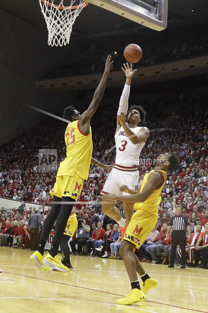 Darron Cummings Indiana's Justin Smith (3) shoots over Maryland's Jalen Smith (25) during the first half of an NCAA college basketball game, Sunday, Jan. 26, 2020, in Bloomington, Ind. (AP Photo/Darron Cummings)