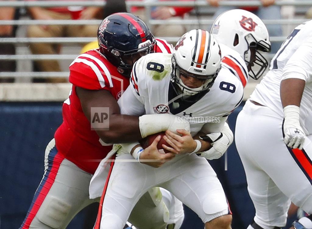 Rogelio V. Solis Auburn quarterback Jarrett Stidham (8) is sacked by Mississippi defensive tackle Benito Jones (95) during the first half of an NCAA college football game on Saturday, Oct. 20, 2018, in Oxford, Miss. Auburn won 31-16. (AP Photo/Rogelio V. Solis)