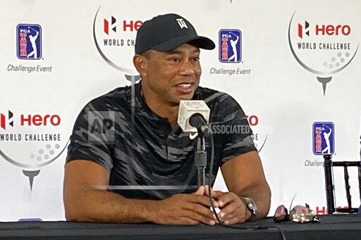 Tiger Woods holds his first press conference since his Feb. 23 car crash in Los Angeles at the Hero World Challenge golf tournament in Nassau, Bahamas, Tuesday, Nov. 30, 2021. (AP Photo/Doug Ferguson)