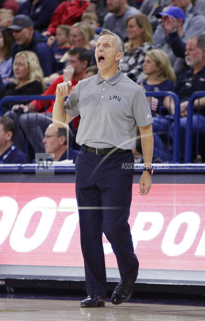 Young Kwak Loyola Marymount coach Mike Dunlap shouts to his team during the first half of an NCAA college basketball game against Gonzaga in Spokane, Wash., Thursday, Jan. 17, 2019. (AP Photo/Young Kwak)