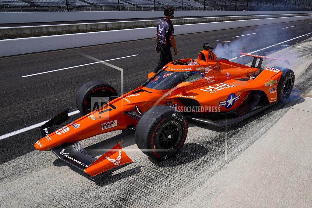 Michael Conroy Conor Daly pulls of of the pit area during practice for the Indianapolis 500 auto race at Indianapolis Motor Speedway in Indianapolis, Friday, Aug. 14, 2020. (AP Photo/Michael Conroy)