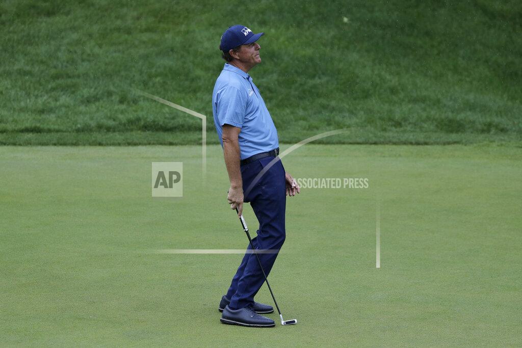 Frank Franklin Ii Phil Mickelson reacts after missing a putt on the 18th green during the third round of the Travelers Championship golf tournament at TPC River Highlands, Saturday, June 27, 2020, in Cromwell, Conn. (AP Photo/Frank Franklin II)