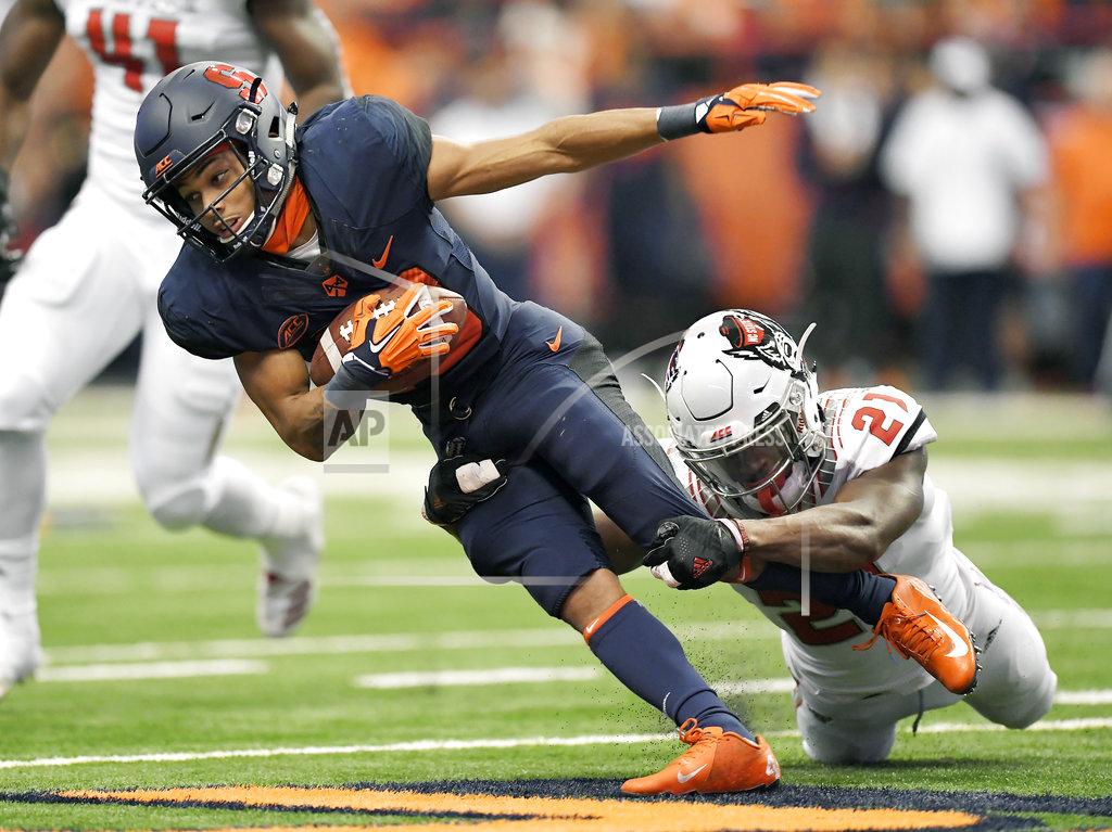 Adrian Kraus Syracuse wide receiver Sean Riley, left, is tackled by NC State defensive back Stephen Griffin during the first half of an NCAA college football game in Syracuse, N.Y., Saturday, Oct. 27, 2018. (AP Photo/Adrian Kraus)