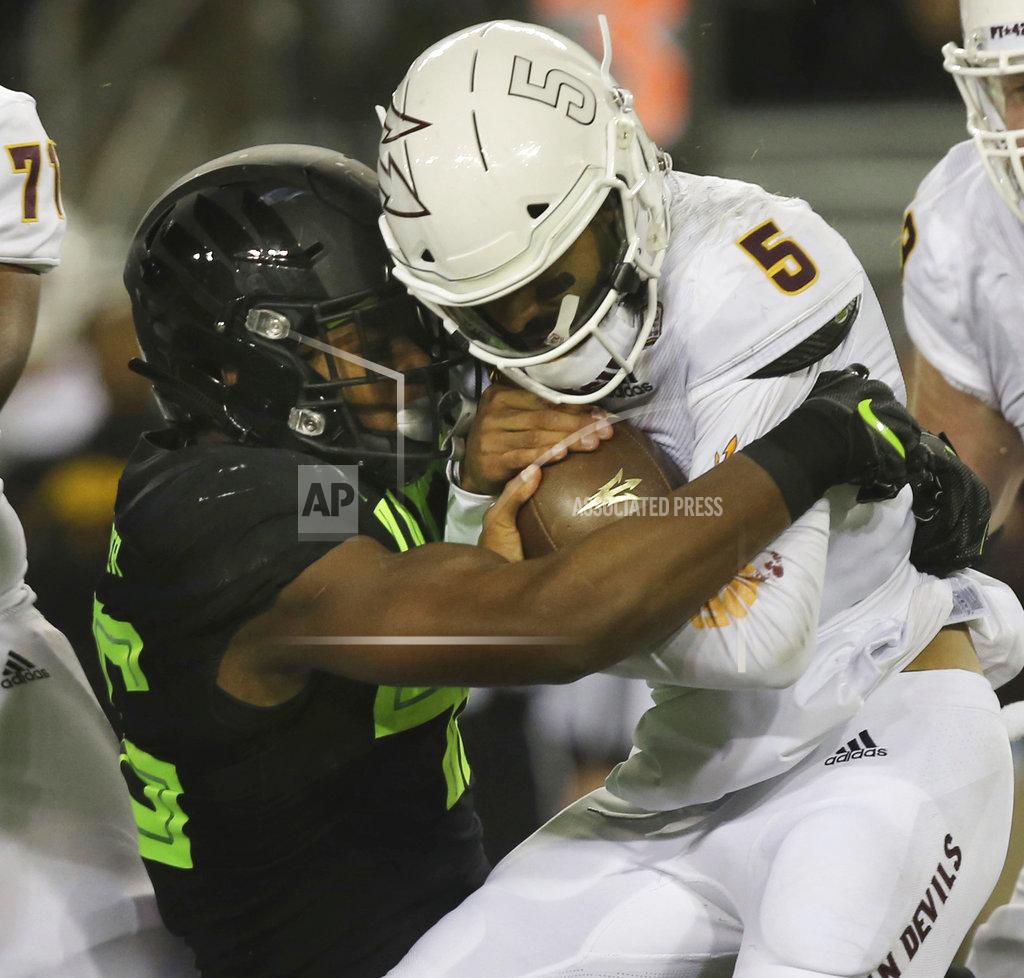 Chris Pietsch Oregon's Gus Cumberlander sacks Arizona State quarterback Manny Wilkins during the third quarter of an NCAA college football game Saturday, Nov. 17, 2018, in Eugene, Ore. (AP Photo/Chris Pietsch)