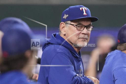 Texas Rangers manager Bruce Bochy watches batting practice before Game 3 of the baseball team's AL Division Series against the Baltimore Orioles in Arlington, Texas, Tuesday, Oct. 10, 2023. (AP Photo/LM Otero)