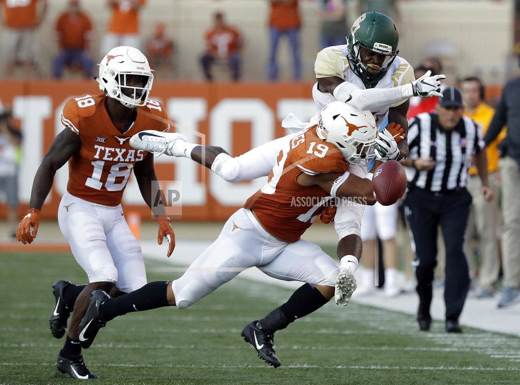 Eric Gay Texas defensive back Brandon Jones (19) breaks up a pass intended for Baylor wide receiver Chris Platt (14) during the second half of an NCAA college football game, Saturday, Oct. 13, 2018, in Austin, Texas. (AP Photo/Eric Gay)
