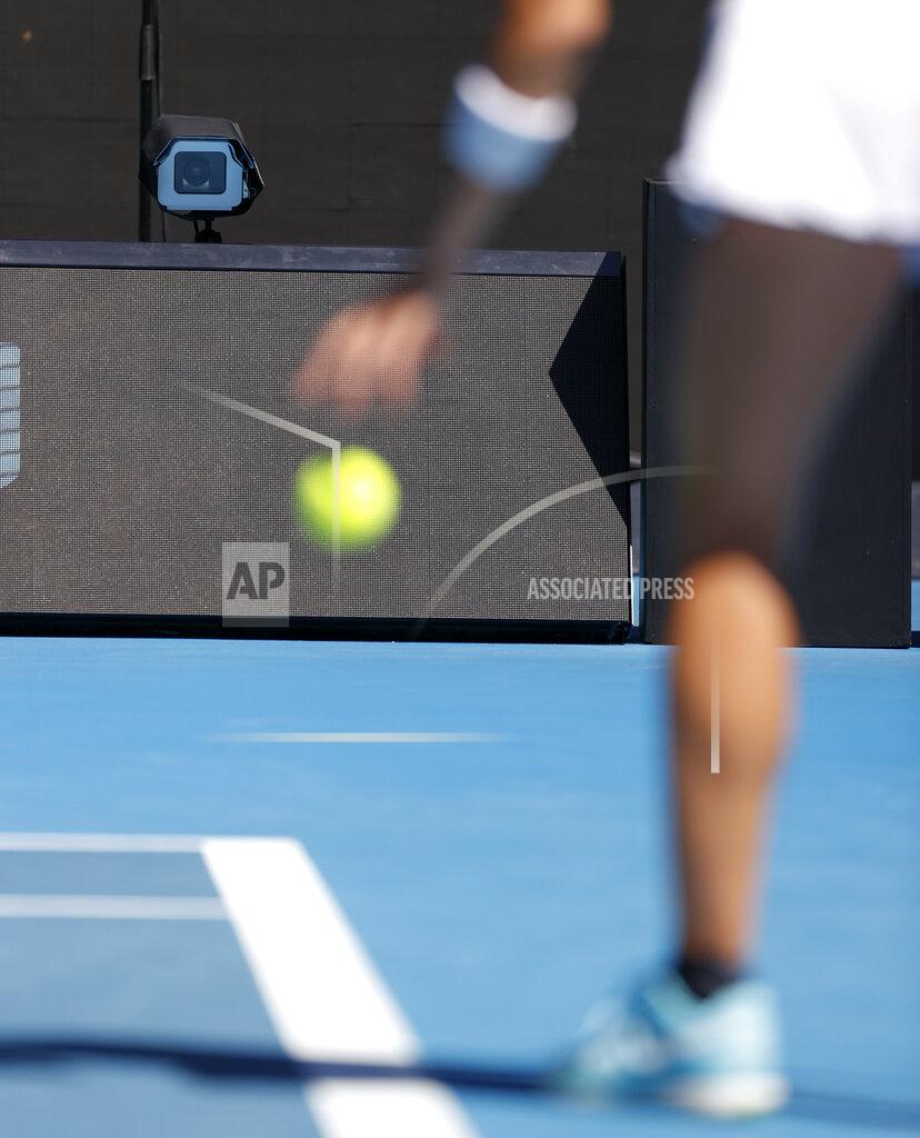 Rick Rycroft A line camera films as Taiwan's Hsieh Su-Wei prepares to serve to Canada's Bianca Andreescu during their second round match at the Australian Open tennis championship in Melbourne, Australia, Wednesday, Feb. 10, 2021. Eliminating all line judges and removing the human element from officiating at the Australian Open might have been a necessary step to reduce the number of people on court amid a pandemic. It also might be good for the integrity of the game, because getting every call right matters so much to players and fans. (AP Photo/Rick Rycroft)