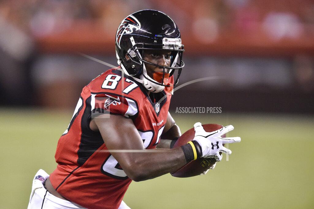 FILE - In this Aug. 18, 2016, file photo, Atlanta Falcons wide receiver Devin Fuller runs the ball in the second half of an NFL preseason football game against the Cleveland Browns in Cleveland. Fuller got his first taste of the NFL's business side during his rookie minicamp. One of the receiver's would-be teammates had a bad practice. Not much later, that player got pulled out of a meeting. Not much after that, the player was no longer Fuller's teammate. (AP Photo/David Richard, File)