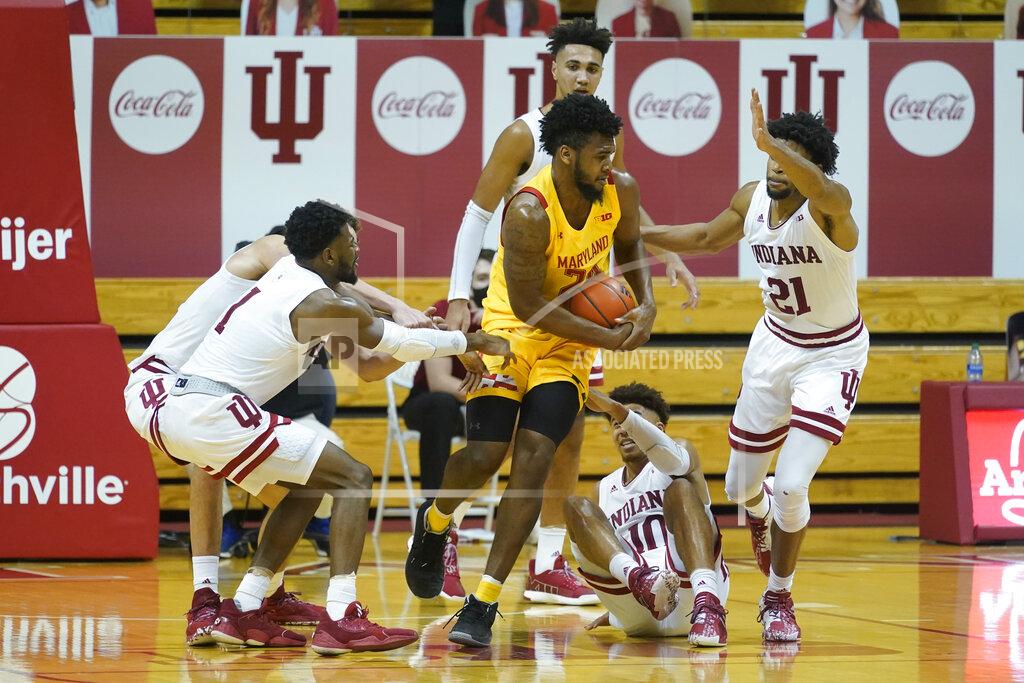 Darron Cummings Maryland forward Donta Scott (24) controls the ball during the second half of an NCAA college basketball game against Indiana, Monday, Jan. 4, 2021, in Bloomington, Ind. (AP Photo/Darron Cummings)