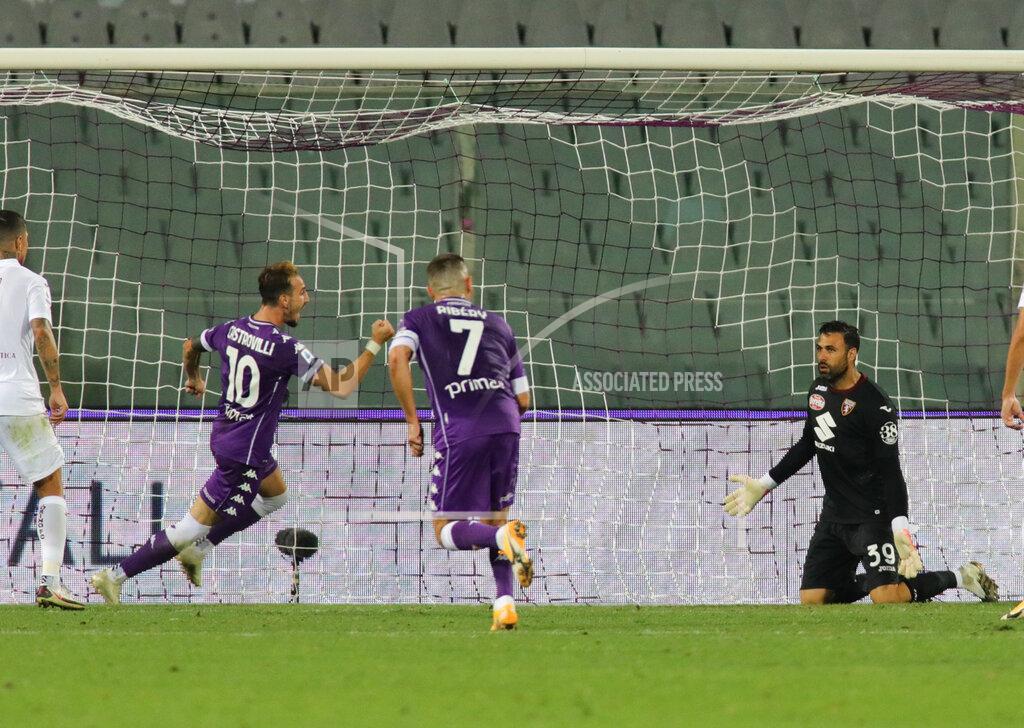 Marco Bucco Fiorentina's Gaetano Castrovilli, left, celebrates after scoring his side's first and decisive goal during the Italian Serie A soccer match between Fiorentina and Torino, at the Artemio Franchi stadium, in Florence, Italy, Saturday, Sept. 19, 2020 (Marco Bucco/LaPresse via AP)