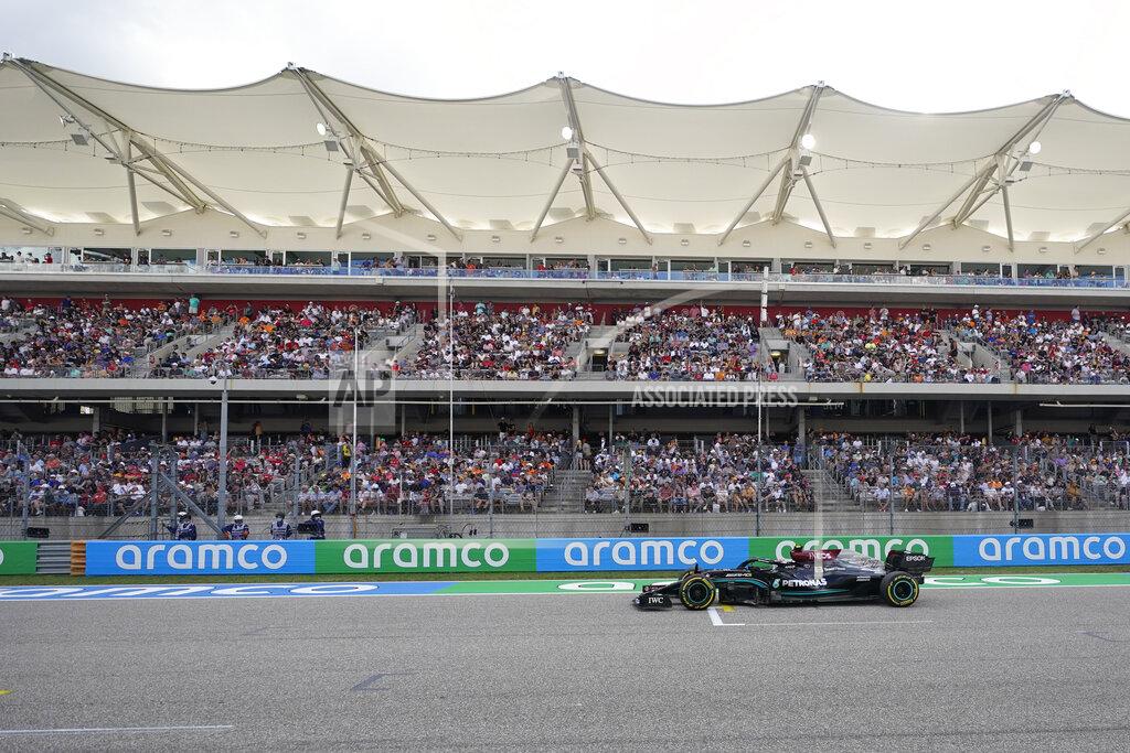 Darron Cummings Mercedes driver Valtteri Bottas, of Finland, drives down the main straightaway during qualifications for the F1 U.S. Grand Prix auto race at Circuit of the Americas, Saturday, Oct. 23, 2021, in Austin, Texas. (AP Photo/Darron Cummings, Pool)