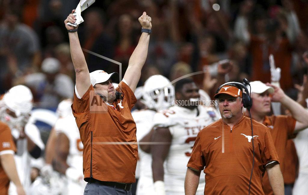 Rusty Costanza Texas coach Tom Herman celebrates a touchdown during the second half against Georgia in the Sugar Bowl NCAA college football game Tuesday, Jan. 1, 2019, in New Orleans. (AP Photo/Rusty Costanza)