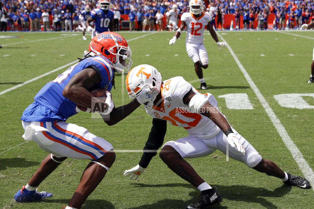 John Raoux Florida wide receiver Tyrie Cleveland, left, trries to get around Tennessee defensive back Bryce Thompson (20) after a reception during the first half of an NCAA college football game, Saturday, Sept. 21, 2019, in Gainesville, Fla. (AP Photo/John Raoux)