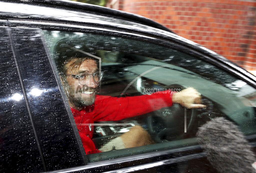 Peter Byrne Liverpool manager Jurgen Klopp arrives at his home in Formby, Liverpool, England, Friday June 26, 2020. Liverpool clinched its first league title since 1990 on Thursday, ending an agonizing title drought. (Peter Byrne/PA via AP)