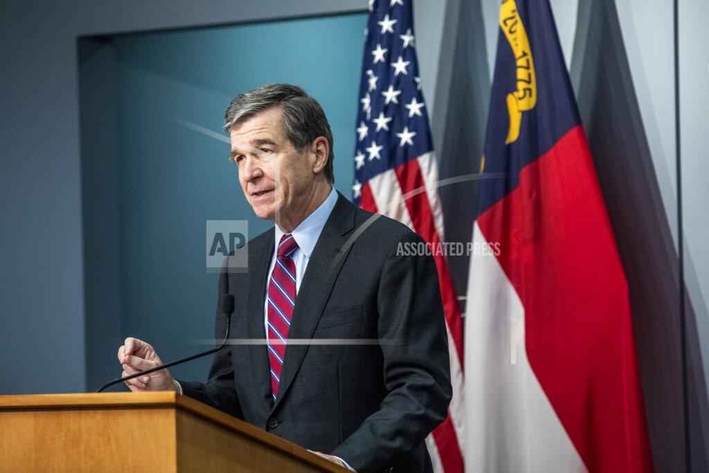 Travis Long North Carolina Gov. Roy Cooper speaks during a briefing on North Carolina's coronavirus pandemic response Wednesday, Jan. 27, 2021 at the NC Emergency Operations Center in Raleigh, N.C. (Travis Long/The News & Observer via AP)