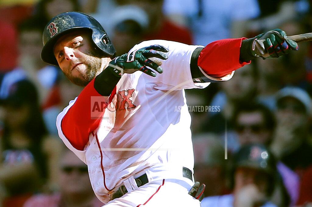Winslow Townson FILE - In this June 13, 2015, file photo, Boston Red Sox's Dustin Pedroia watches a hit against the Toronto Blue Jays during the 10th inning of a baseball game at Fenway Park in Boston. Pedroia, who was the 2007 Rookie of the Year and the AL MVP in his second season, retired Monday, Feb. 1, 2021. (AP Photo/Winslow Townson, File)