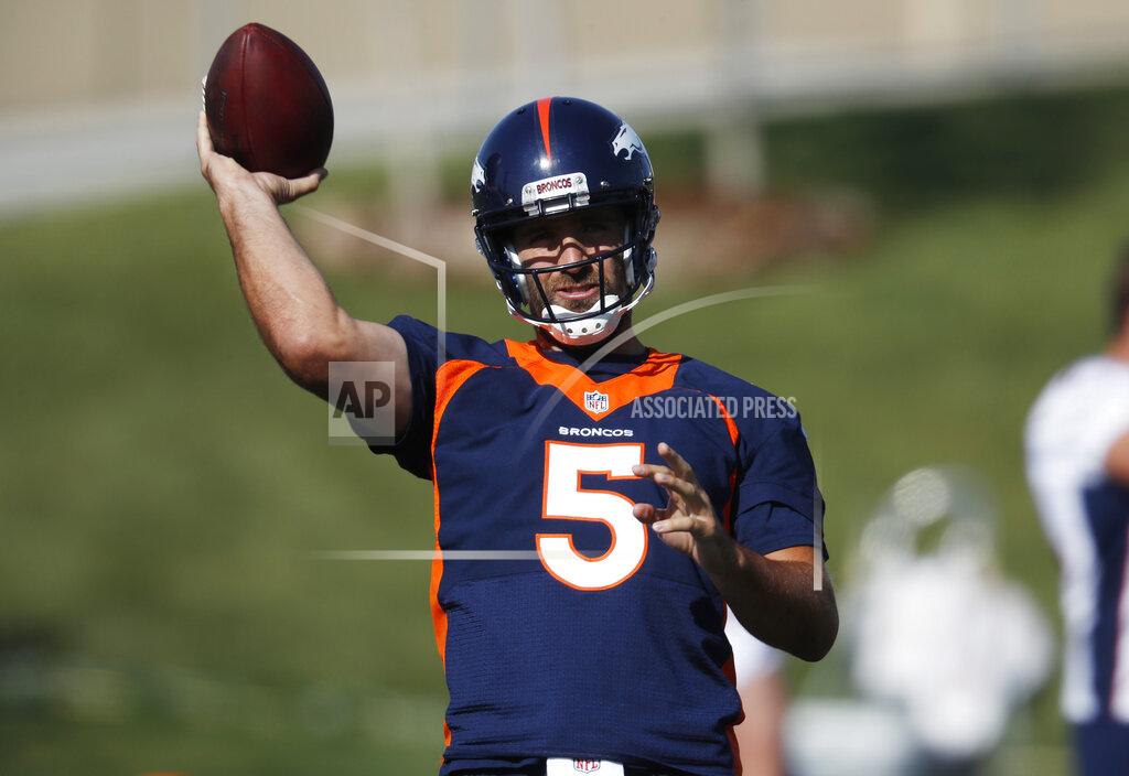 David Zalubowski Denver Broncos quarterback Joe Flacco takes part in drills during the opening day of the team's NFL football training camp Thursday, July 18, 2019, in Englewood, Colo. (AP Photo/David Zalubowski)