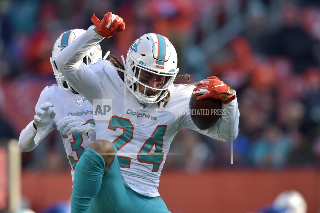 David Richard Miami Dolphins cornerback Ryan Lewis celebrates an interception during the second half of an NFL football game against the Cleveland Browns, Sunday, Nov. 24, 2019, in Cleveland. (AP Photo/David Richard)