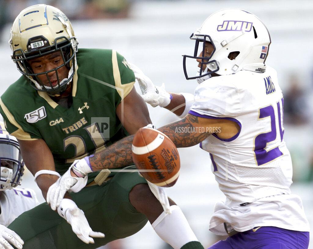 Daniel Sangjib Min James Madison's D'Angelo Amos, right, knocks down a pass intended for William & Mary's Jordan Lowery during the second half of an NCAA college football game in Williamsburg, Va., on Saturday, Oct. 19, 2019. (Daniel Sangjib Min/Richmond Times-Dispatch via AP)