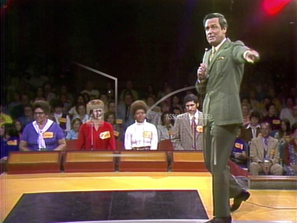 Uncredited This image released by CBS shows host Bob Barkers on first episode of "The Price os Right" in Los Angeles. The longest-running game show in television history is celebrating it’s 50th season. (CBS Entertainment via AP)