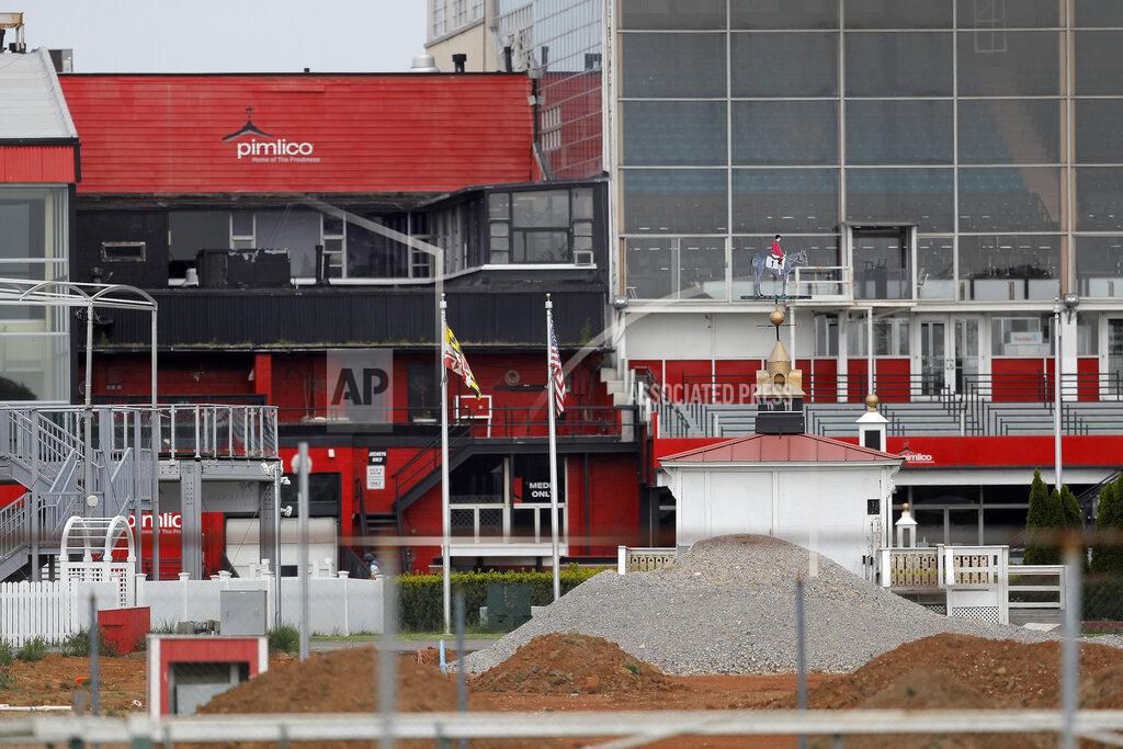 Julio Cortez The grandstand near the finish line at Pimlico Race Course is seen empty, Friday, May 15, 2020, in Baltimore. The Preakness would have been run Saturday, May 16, 2020, in Baltimore. But Pimlico Race Course and many tracks across North America remain dark because of the coronavirus pandemic. (AP Photo/Julio Cortez)